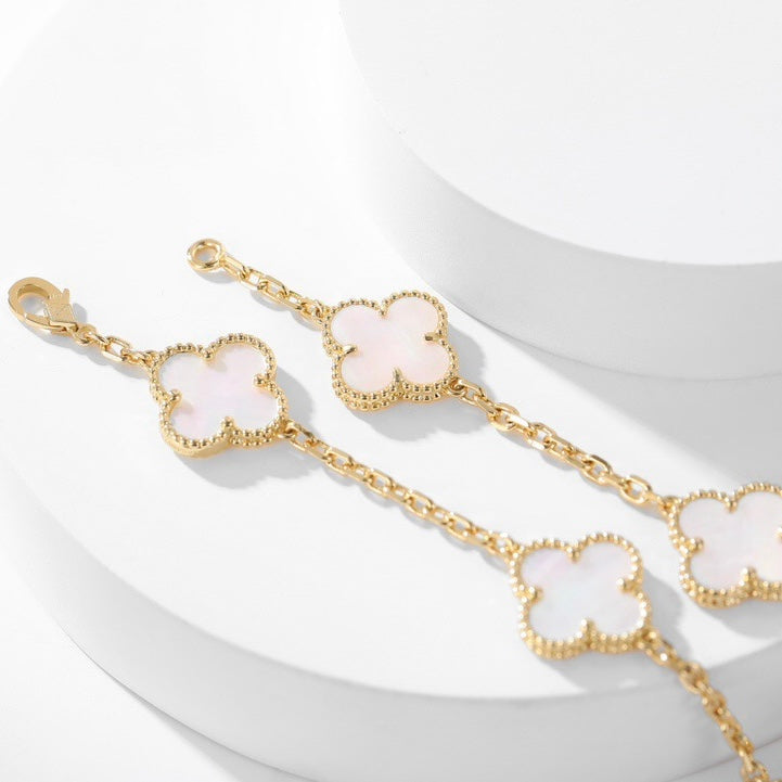 {
"Bling Jewelrys": "ブリング・ジュエリー",
"CLOVER 10 MOTIFS WHITE MOTHER OF PEARL NECKLACE": "クローバー 10モチーフ ホワイトマザーオブパール ネックレス"
}
