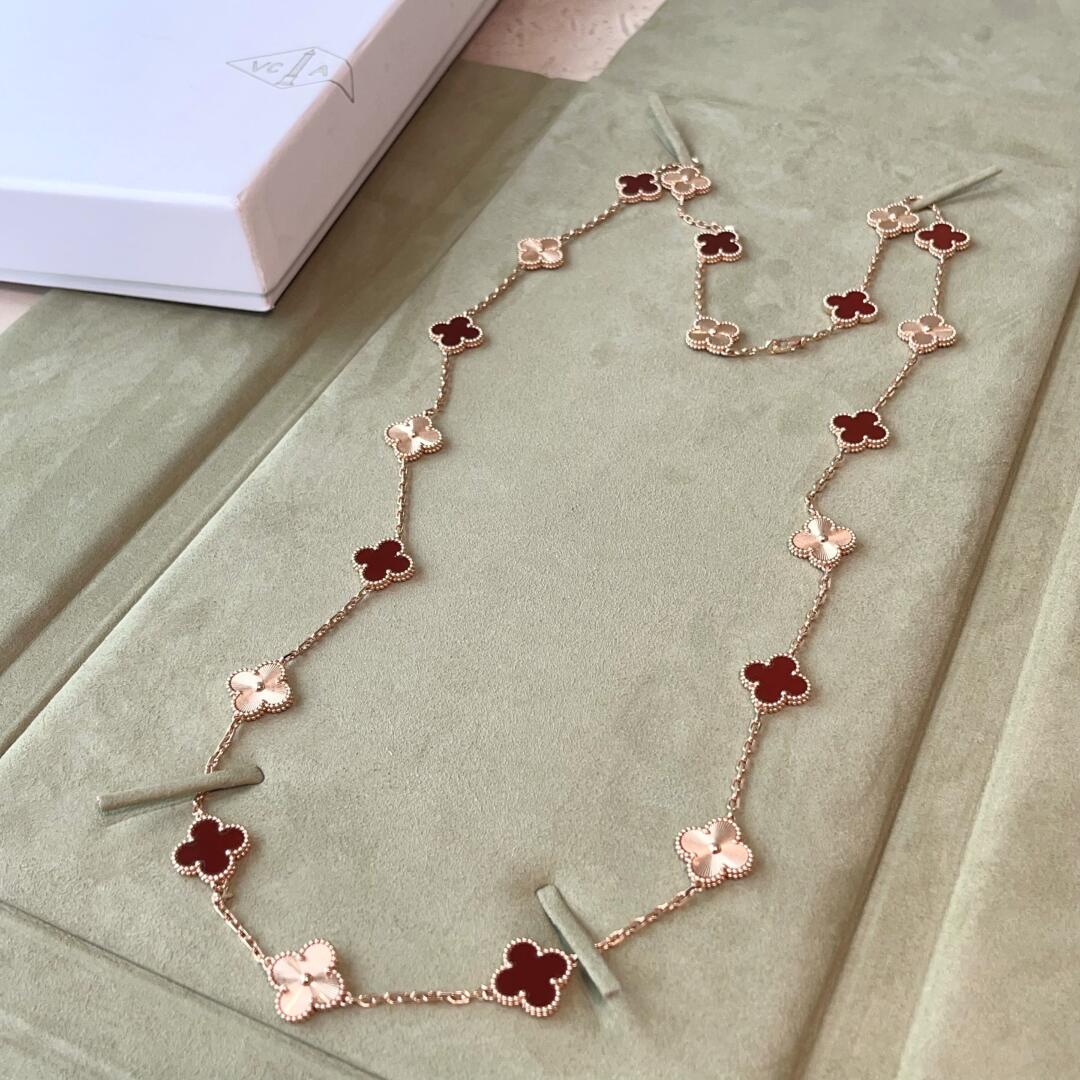 {
  "Bling Jewelrys": "Bling Jewelrys",
  "CLOVER 20 MOTIFS LASER CARNELIAN NECKLACE": "KLEEBLATT 20 MOTIVE LASER KARNEOL HALSKETTE"
}