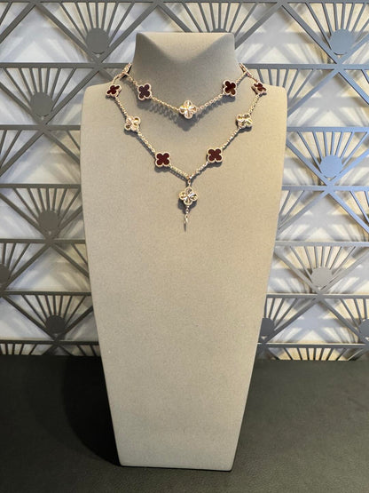 {
  "Bling Jewelrys": "Bling Jewelrys",
  "CLOVER 20 MOTIFS LASER CARNELIAN NECKLACE": "KLEEBLATT 20 MOTIVE LASER KARNEOL HALSKETTE"
}