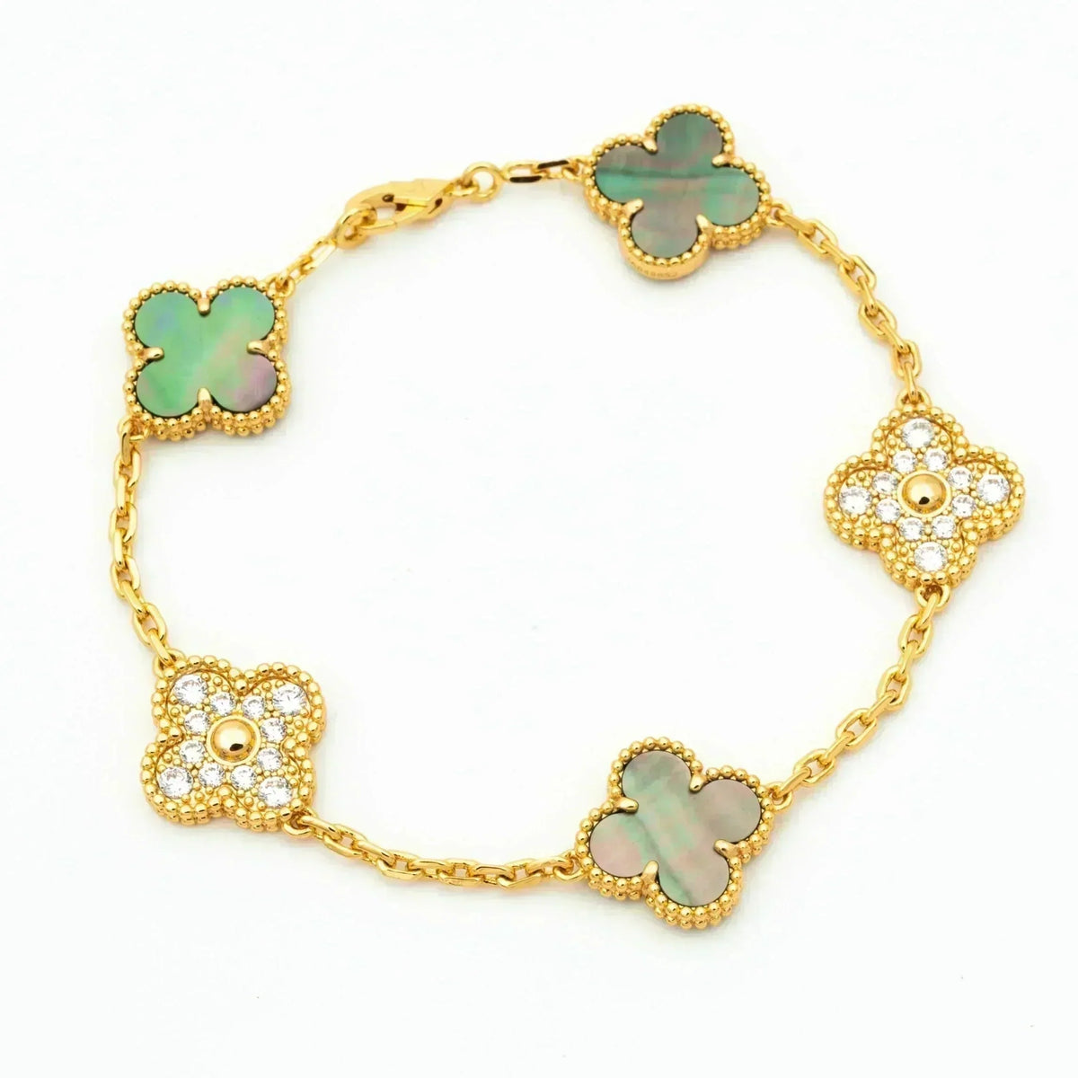 {
  "Bling Jewelrys": "Bling Jewelry",
  "CLOVER 5 MOTIF GRAY MOP BRACELET COLLECTION": "KLEEBLATT 5-MOTIV GRAU PERLMUTT ARMBAND KOLLEKTION"
}