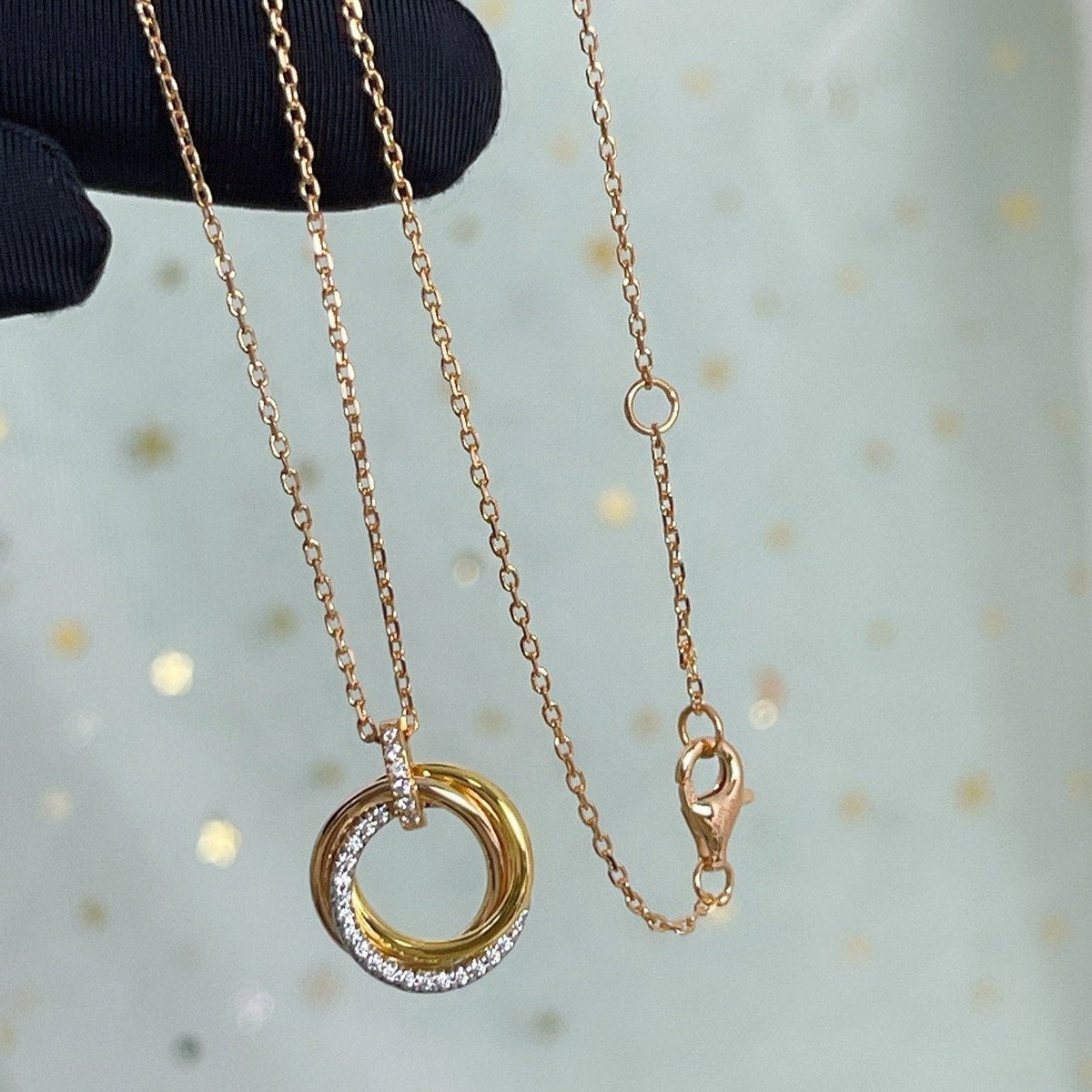 {
  "Bling Jewelrys": "ブリングジュエリー",
  "TRINITY NECKLACE SILVER GOLD PINK GOLD DIAMONDS": "トリニティネックレス シルバー ゴールド ピンクゴールド ダイヤモンド"
}