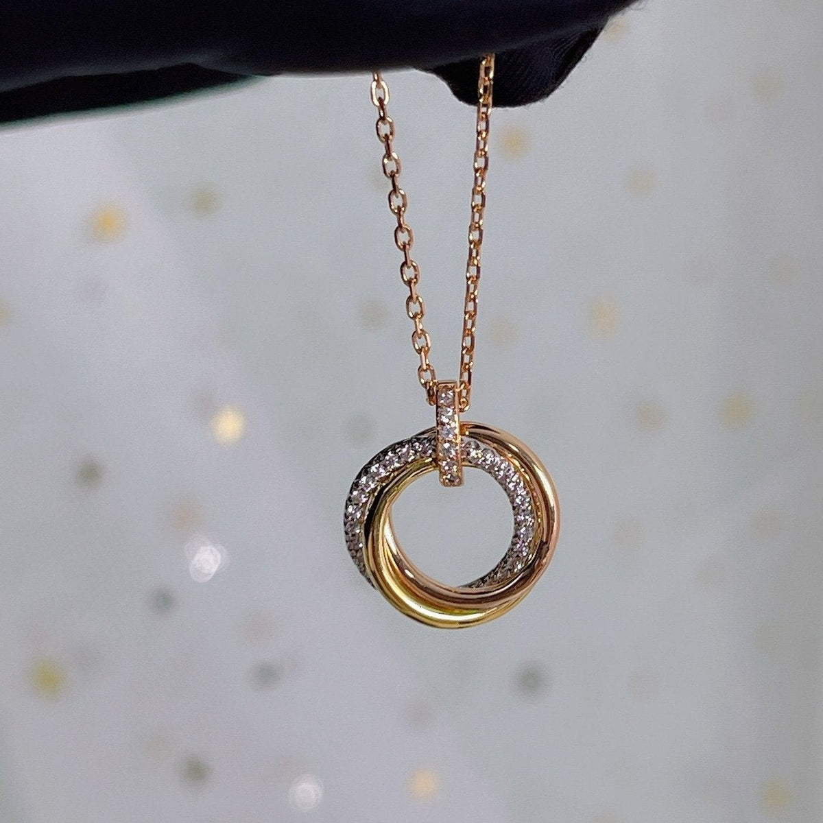 {
  "Bling Jewelrys": "ブリングジュエリー",
  "TRINITY NECKLACE SILVER GOLD PINK GOLD DIAMONDS": "トリニティネックレス シルバー ゴールド ピンクゴールド ダイヤモンド"
}