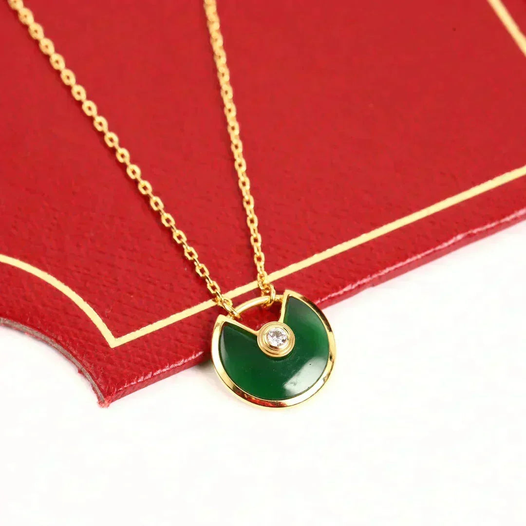 {
  "Bling Jewelrys": "ブリングジュエリー",
  "AMULETTE GOLD MALACHITE NECKLACE": "アミュレット ゴールド マラカイト ネックレス"
}