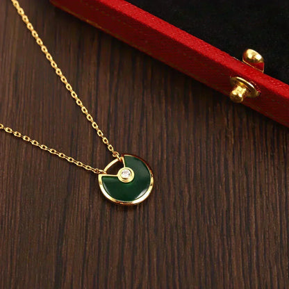 {
  "Bling Jewelrys": "ブリングジュエリー",
  "AMULETTE GOLD MALACHITE NECKLACE": "アミュレット ゴールド マラカイト ネックレス"
}