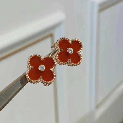 {
  "Bling Jewelrys": "Bling Jewelrys",
  "CLOVER MEDIUM 1 MOTIFS CARNELIAN  DIAMOND earrings": "KLEEBATT MITTEL 1 MOTIV KARNEOL DIAMANT Ohrringe"
}