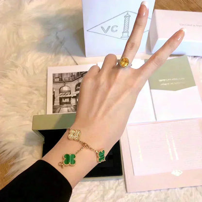 {
  "Bling Jewelrys ": "Bling Jewelrys ",
  "CLOVER  5 MOTIF MALACHITE BRACELET COLLECTION": "KLEEBLATT 5-MOTIV MALACHIT-ARMBAND KOLLEKTION"
}