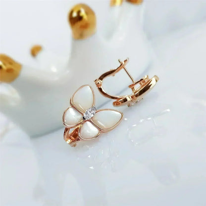 [Bling Jewelrys ]SCHMETTERLINGS-OHRRINGE AUS PERLMUTT MIT DIAMANTEN