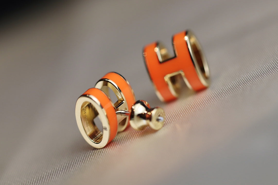 {
  "Bling Jewelrys": "ブリング・ジュエリー",
  "MINI POP H EARRINGS ORANGE": "ミニ ポップ H ピアス オレンジ"
}