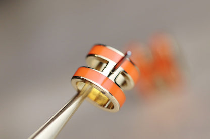 {
  "Bling Jewelrys": "ブリング・ジュエリー",
  "MINI POP H EARRINGS ORANGE": "ミニ ポップ H ピアス オレンジ"
}