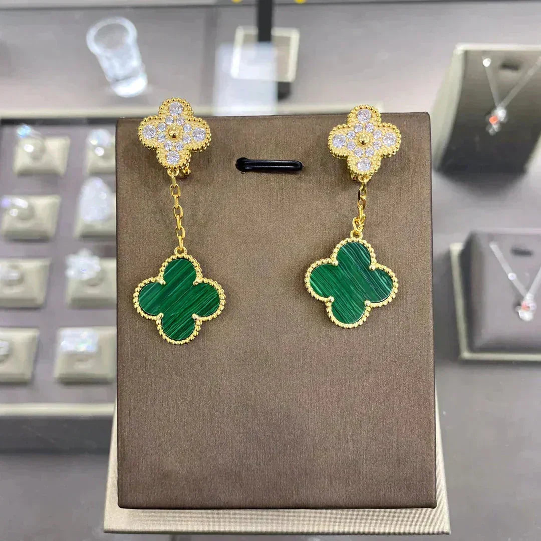 {
  "Bling Jewelrys ": "Bling Jewelrys ",
  "CLOVER  2 MOTIFS  DIAMOND  EARRINGS (MULTIPLE CHOICES?¡ä": "KLEEBLATT 2 MOTIVE DIAMANT-OHRRINGE (MEHRERE OPTIONEN)"
}