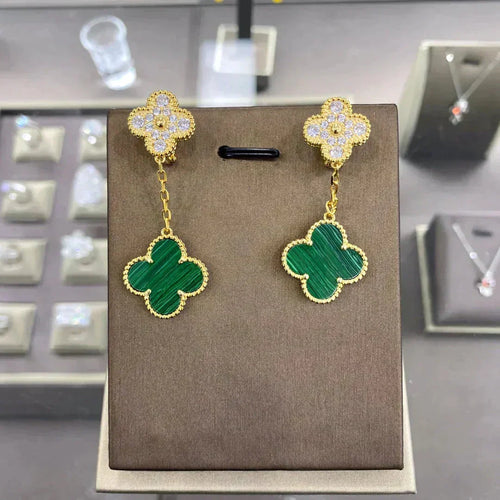 {
  "Bling Jewelrys ": "Bling Jewelrys ",
  "CLOVER  2 MOTIFS  DIAMOND  EARRINGS (MULTIPLE CHOICES?¡ä": "KLEEBLATT 2 MOTIVE DIAMANT-OHRRINGE (MEHRERE OPTIONEN)"
}