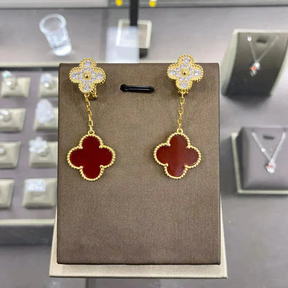 {
  "Bling Jewelrys ": "Bling Jewelrys ",
  "CLOVER  2 MOTIFS  DIAMOND  EARRINGS (MULTIPLE CHOICES?¡ä": "KLEEBLATT 2 MOTIVE DIAMANT-OHRRINGE (MEHRERE OPTIONEN)"
}