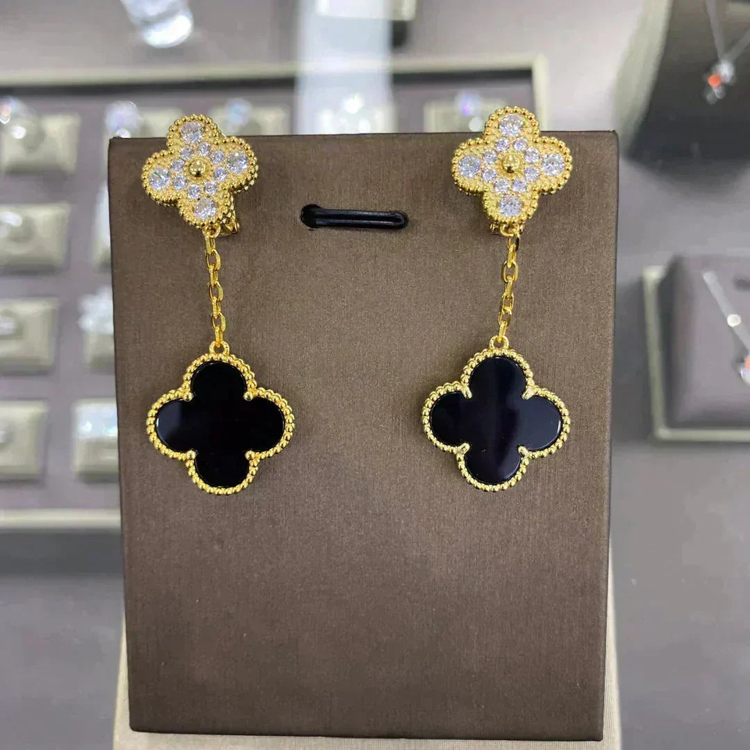 {
  "Bling Jewelrys ": "Bling Jewelrys ",
  "CLOVER  2 MOTIFS  DIAMOND  EARRINGS (MULTIPLE CHOICES?¡ä": "KLEEBLATT 2 MOTIVE DIAMANT-OHRRINGE (MEHRERE OPTIONEN)"
}