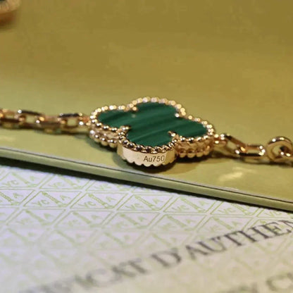 {
  "Bling Jewelrys ": "Bling Jewelrys ",
  "CLOVER  5 MOTIF MALACHITE BRACELET COLLECTION": "KLEEBLATT 5-MOTIV MALACHIT-ARMBAND KOLLEKTION"
}