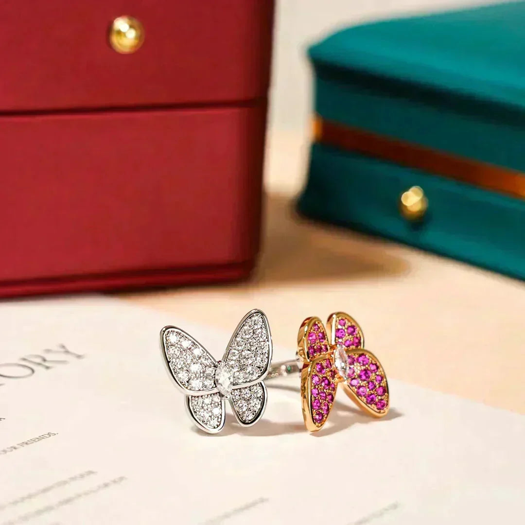 {
  "Bling Jewelrys": "Bling Jewelry",
  "TWIN BUTTERFLY DIAMOND RING": "DOPPEL-SCHMETTERLINGS-DIAMANT-RING"
}