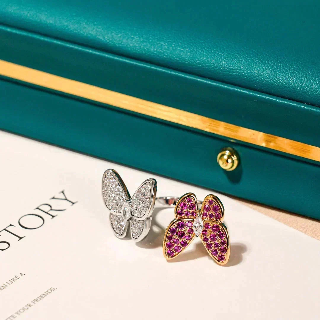 {
  "Bling Jewelrys": "Bling Jewelry",
  "TWIN BUTTERFLY DIAMOND RING": "DOPPEL-SCHMETTERLINGS-DIAMANT-RING"
}
