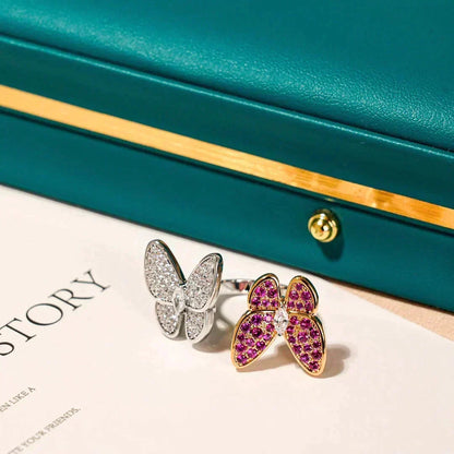 {
  "Bling Jewelrys": "Bling Jewelry",
  "TWIN BUTTERFLY DIAMOND RING": "DOPPEL-SCHMETTERLINGS-DIAMANT-RING"
}