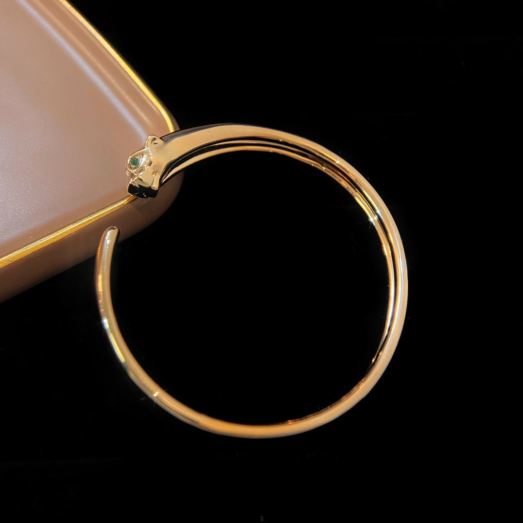 {"Bling Jewelrys": "PANTHÈRE GOLD OFFENES ARMBAND"}