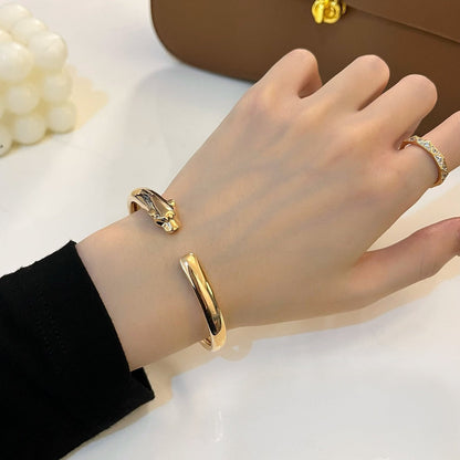 {"Bling Jewelrys": "PANTHÈRE GOLD OFFENES ARMBAND"}