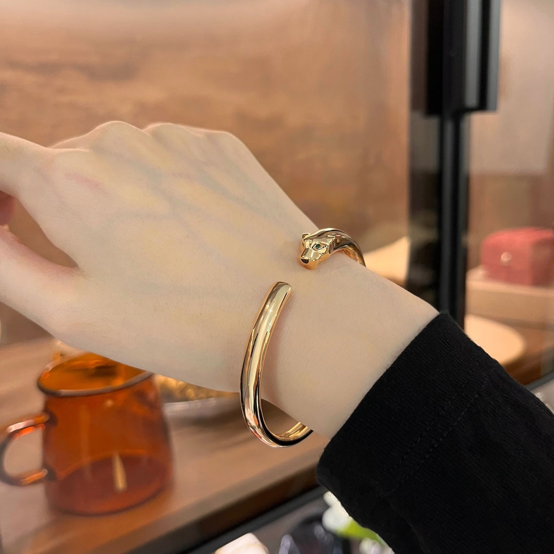 {"Bling Jewelrys": "PANTHÈRE GOLD OFFENES ARMBAND"}