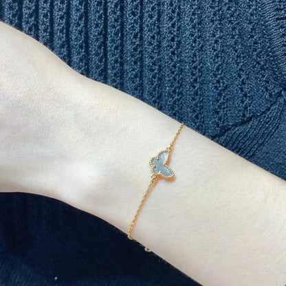 [Bling Jewelrys ]SCHMETTERLINGSARMBAND AUS DUNKLEM PERLMUTT