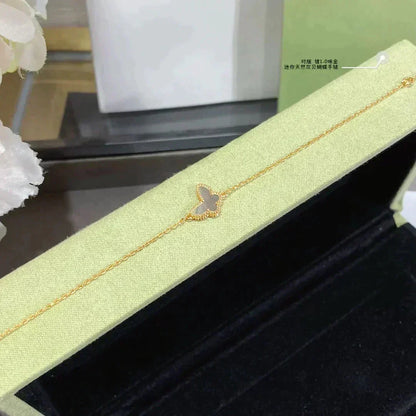 [Bling Jewelrys ]SCHMETTERLINGSARMBAND AUS DUNKLEM PERLMUTT