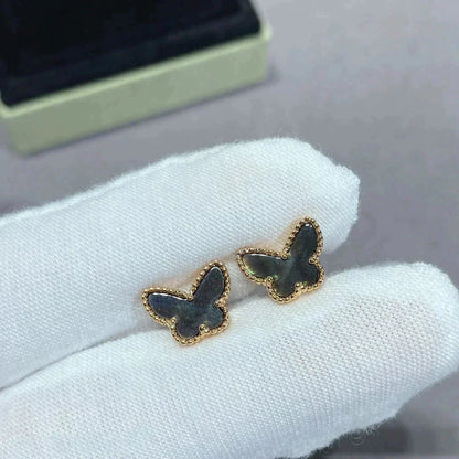 {
  "Bling Jewelrys": "Bling Jewelry",
  "BUTTERFLY DARK MOP  EARRINGS": "SCHMETTERLINGS-OHRRINGE AUS DUNKLEM PERLMUTT"
}
