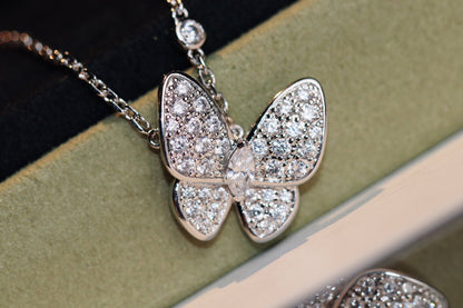 {
  "Bling Jewelrys": "Bling Jewelrys",
  "BUTTERFLY DIAMOND NECKLACE": "SCHMETTERLINGS-DIAMANTHALSKETTE"
}