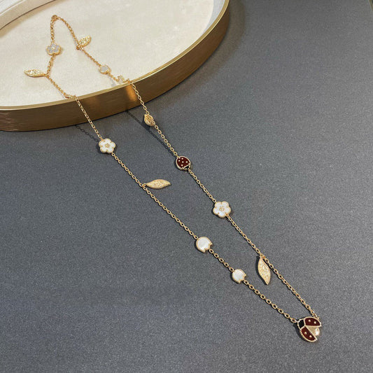 {
  "Bling Jewelrys ": "Bling Jewelrys ",
  "LUCKY SPRING 15 MOTIFS GOLD NECKLACE": "LUCKY SPRING GOLDHALSKETTE MIT 15 MOTIVEN"
}