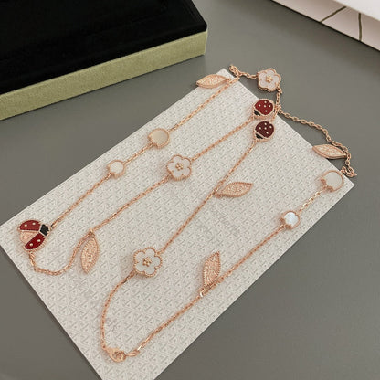 {"Bling Jewelrys": "Bling Jewelrys", "LUCKY SPRING 15 MOTIFS ROSE GOLD NECKLACE": "LUCKY SPRING HALSKETTE MIT 15 MOTIVEN IN ROSÉGOLD"}