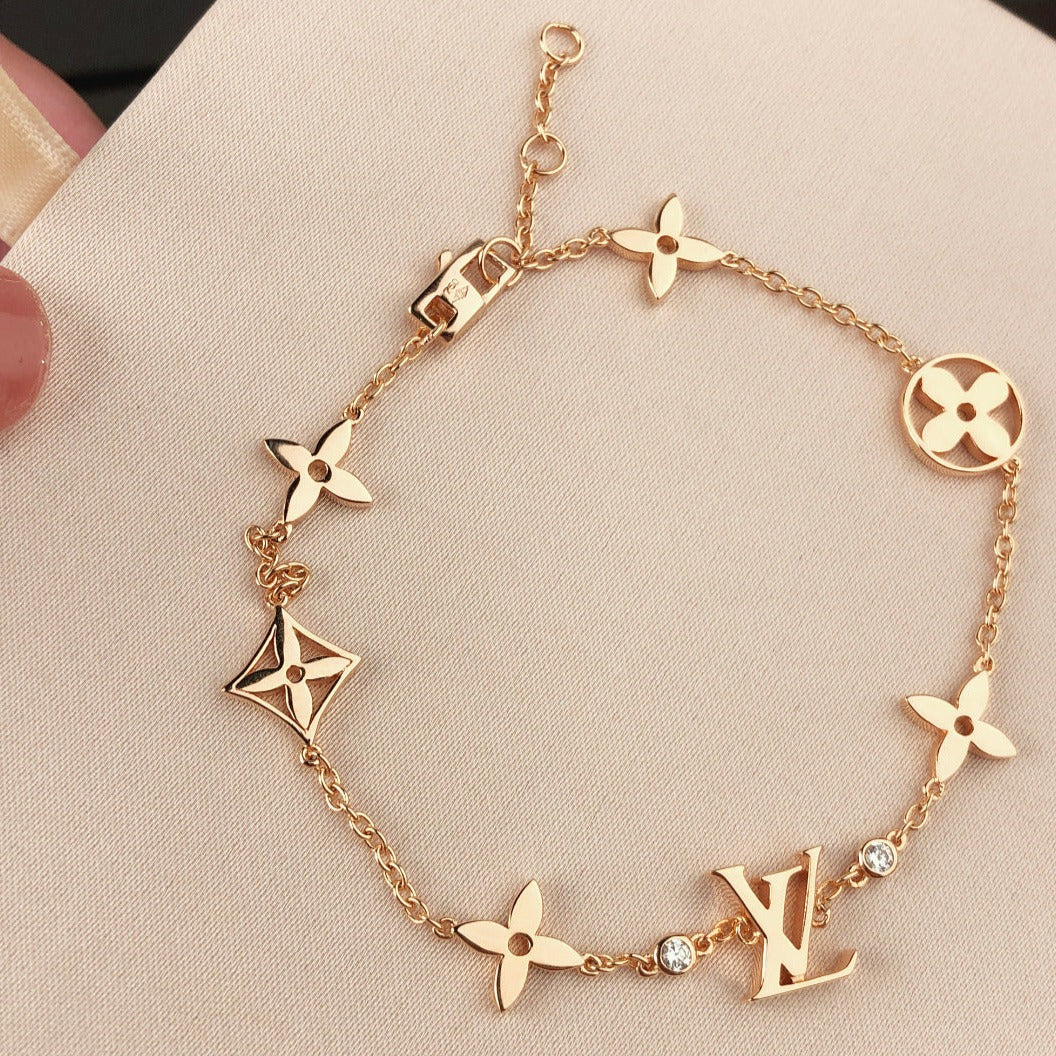 [Bling Jewelrys ]STAR AND SUN 7 MOTIFS GOLD BRACELET