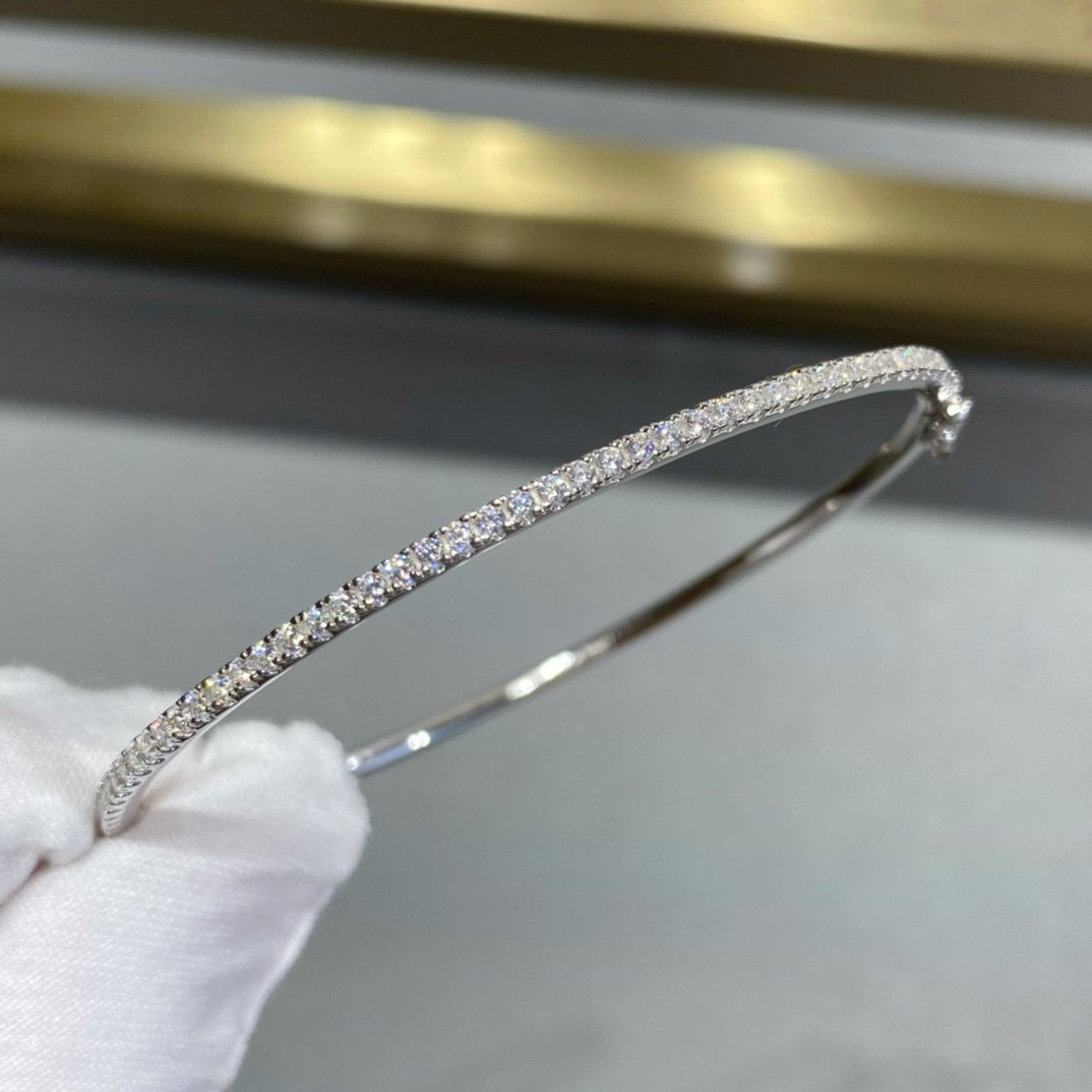 {
  "Bling Jewelrys": "Bling Jewelry",
  "MINI DIAMOND TENNIS BRACELET": "MINI-DIAMANT-TENNISARMBAND"
}