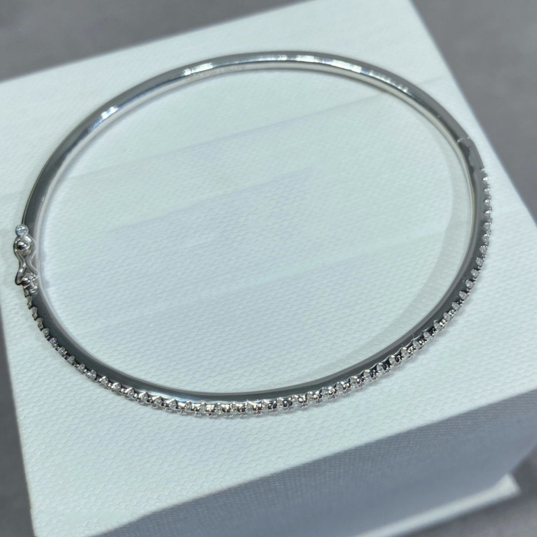 {
  "Bling Jewelrys": "Bling Jewelry",
  "MINI DIAMOND TENNIS BRACELET": "MINI-DIAMANT-TENNISARMBAND"
}