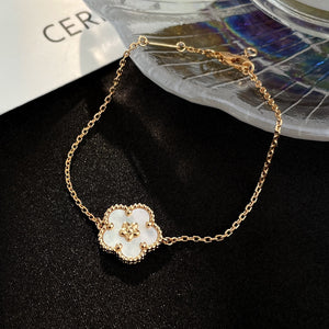 {
  "Bling Jewelrys": "ブリングジュエリー",
  "LUCKY SPRING ROSE GOLD MOP BRACELET": "ラッキースプリング ローズゴールド マザーオブパール ブレスレット"
}