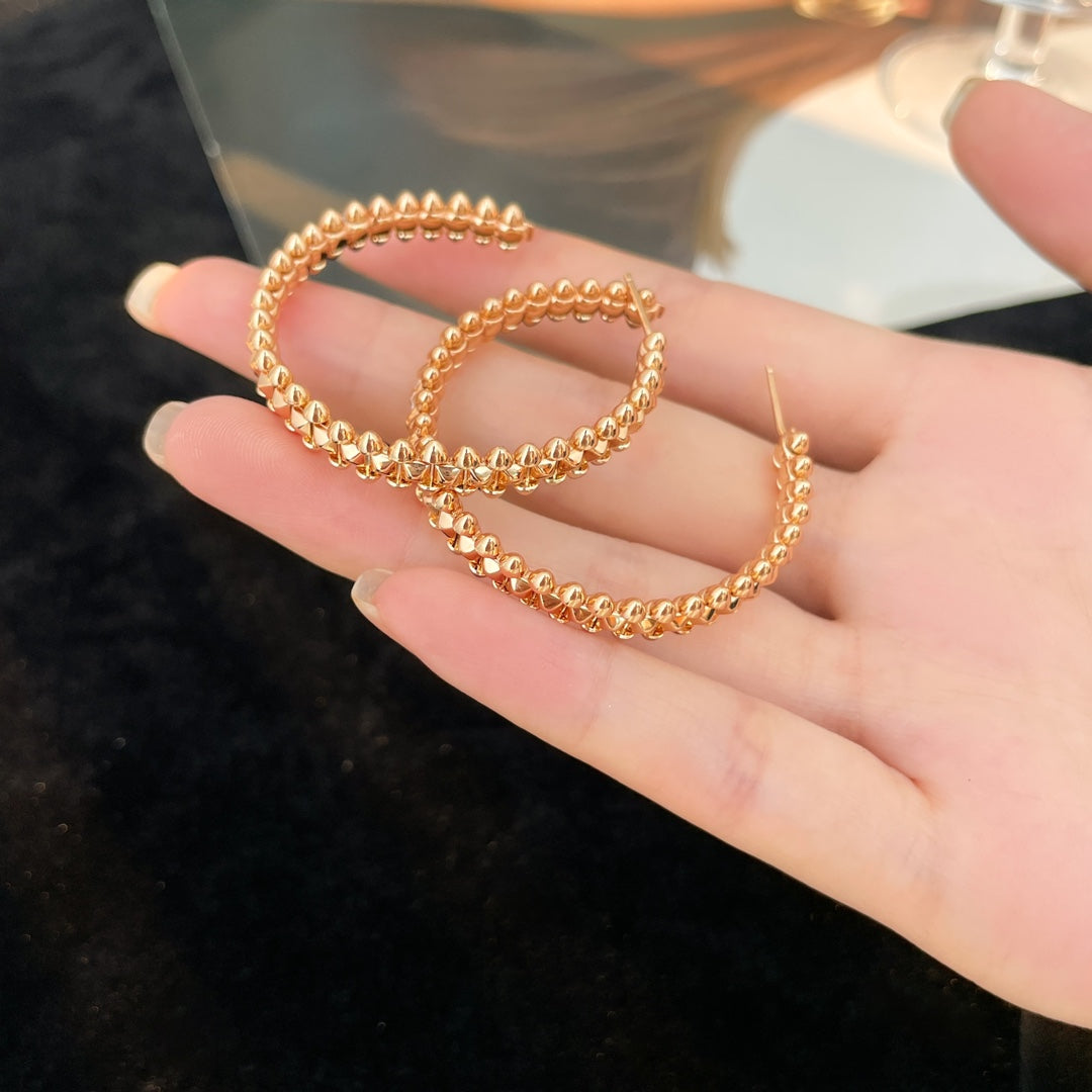 {
"Bling Jewelrys": "ブリングジュエリー",
"CLASH HOOP EARRINGS": "クラッシュフープピアス"
}