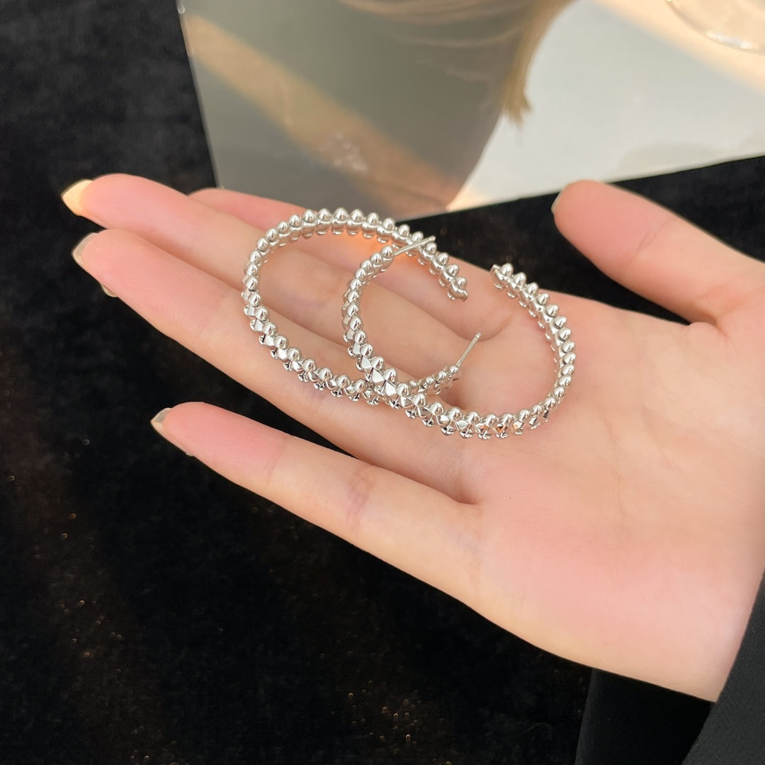 {
"Bling Jewelrys": "ブリングジュエリー",
"CLASH HOOP EARRINGS": "クラッシュフープピアス"
}