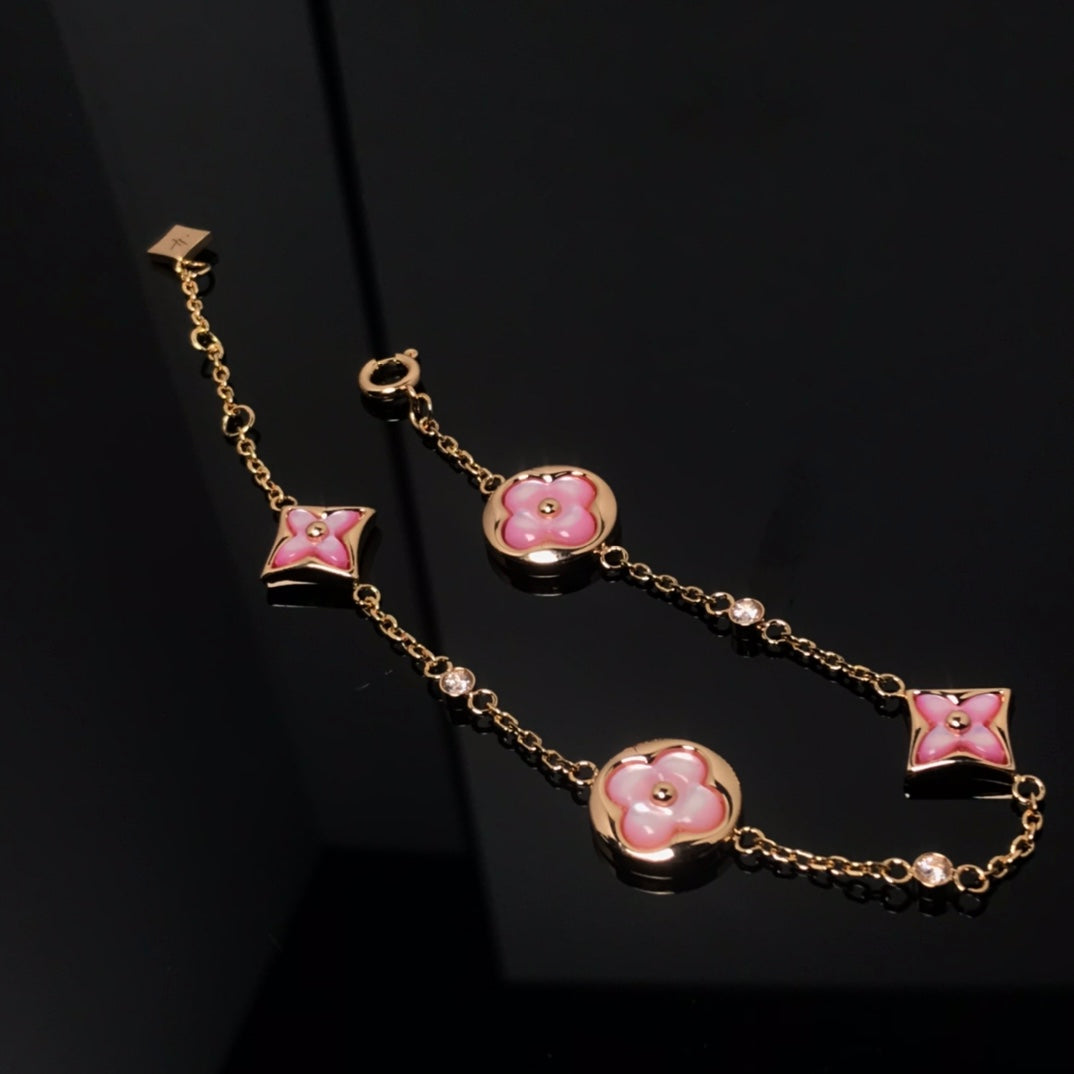 [Bling Jewelrys ]STAR AND SUN 4 MOTIF PINK MOP PINK GOLD BRACELET