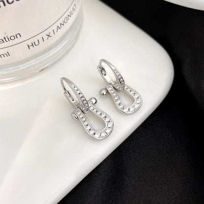 {
  "Bling Jewelrys": "Bling Jewelrys",
  "FORCE 10 FULL DIAMOND DROP EARRINGS MEDIUM MODEL": "FORCE 10 OHRHÄNGER MIT VOLLBESATZ AUS DIAMANTEN, MITTLERES MODELL"
}