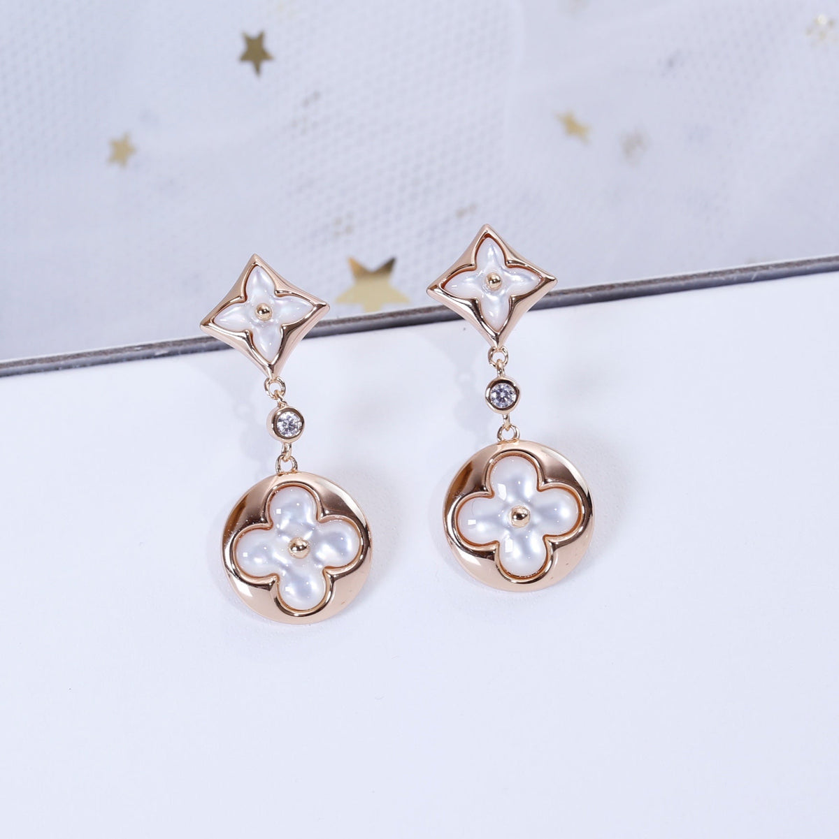 {
  "[Bling Jewelrys ]STAR AND SUN PINK GOLD MOP DROP EARRINGS": "【Bling Jewelry】スター＆サン ピンクゴールド マザーオブパール ドロップピアス"
}