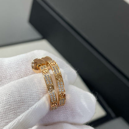 {"Bling Jewelrys": "Bling Jewelrys", "LOVE DIAMOND PINK GOLD HOOP EARRINGS": "LOVE DIAMANT CREOLEN IN ROSÉGOLD"}