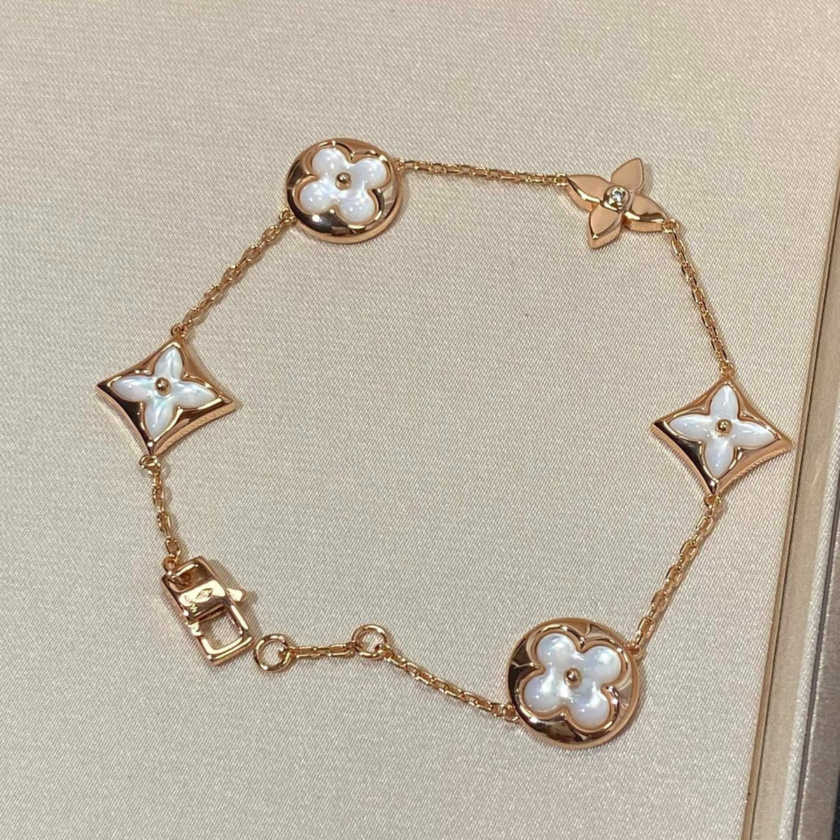 [Bling Jewelrys ]STAR AND SUN 5 MOTIF MOP PINK GOLD BRACELET
