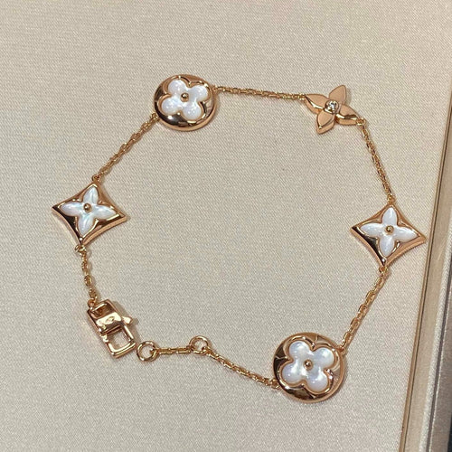 [Bling Jewelrys ]STAR AND SUN 5 MOTIF MOP PINK GOLD BRACELET