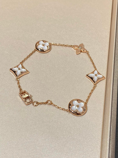 [Bling Jewelrys ]STAR AND SUN 5 MOTIF MOP PINK GOLD BRACELET