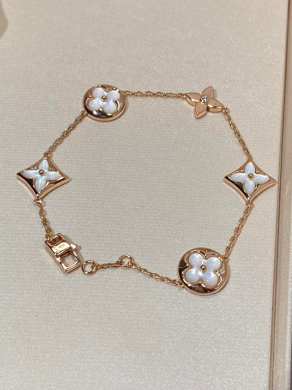 [Bling Jewelrys ]STAR AND SUN 5 MOTIF MOP PINK GOLD BRACELET