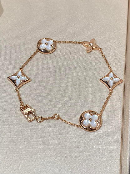 [Bling Jewelrys ]STAR AND SUN 5 MOTIF MOP PINK GOLD BRACELET