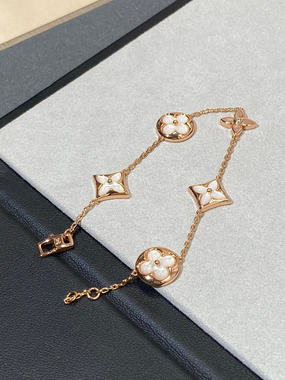 [Bling Jewelrys ]STAR AND SUN 5 MOTIF MOP PINK GOLD BRACELET