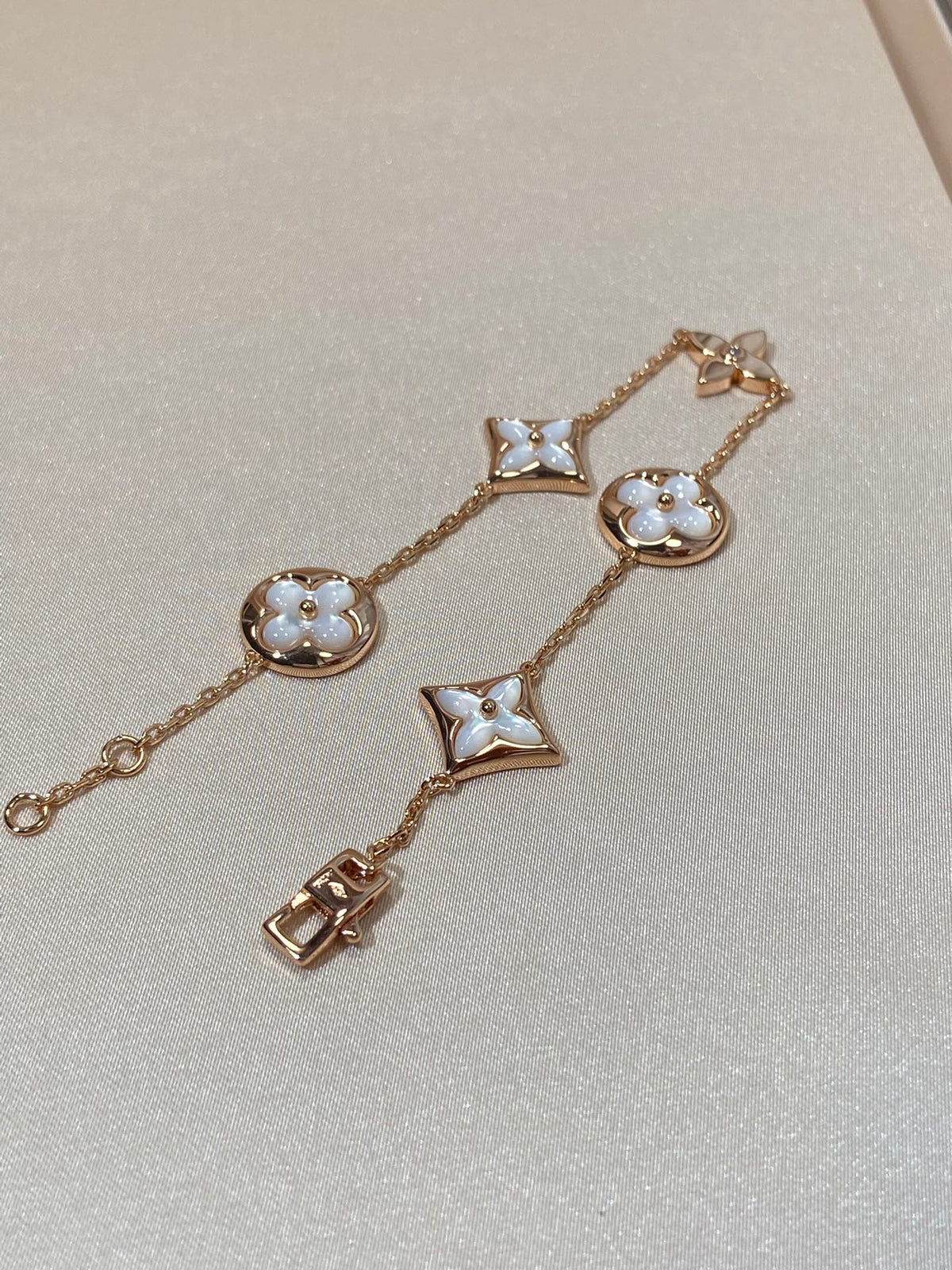 [Bling Jewelrys ]STAR AND SUN 5 MOTIF MOP PINK GOLD BRACELET