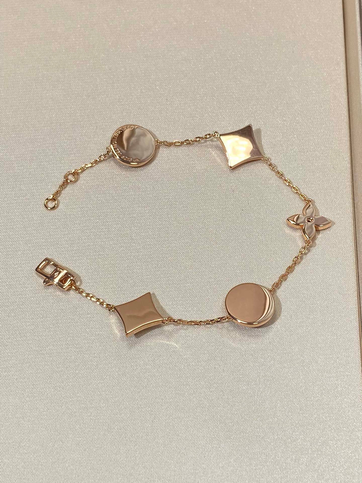 [Bling Jewelrys ]STAR AND SUN 5 MOTIF MOP PINK GOLD BRACELET