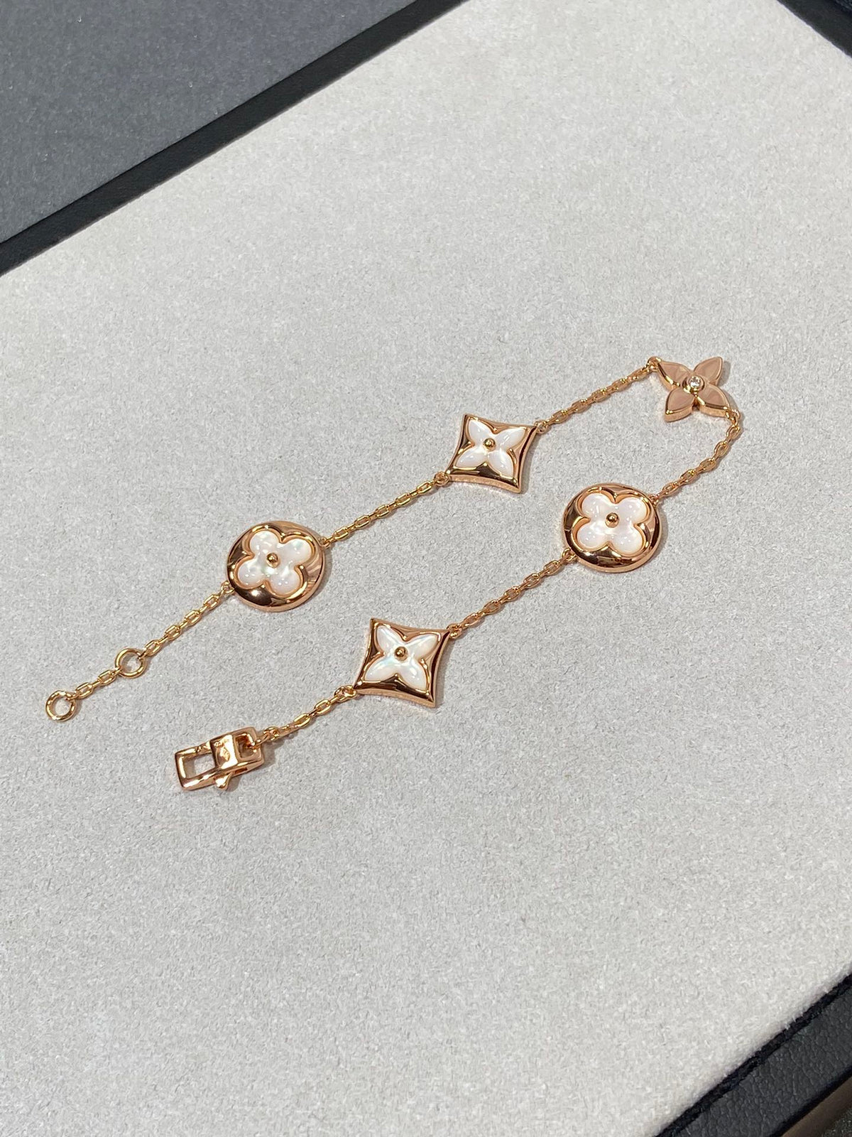 [Bling Jewelrys ]STAR AND SUN 5 MOTIF MOP PINK GOLD BRACELET