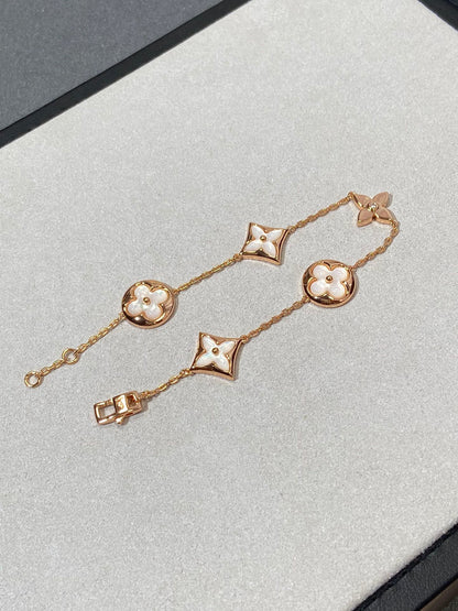 [Bling Jewelrys ]STAR AND SUN 5 MOTIF MOP PINK GOLD BRACELET